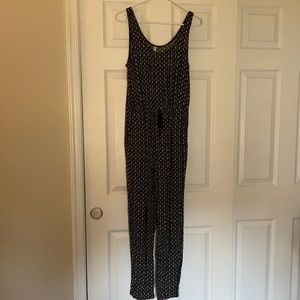 Xhilaration jumpsuit tank top, 2 side pockets, 2 back pockets.  Elastic waist